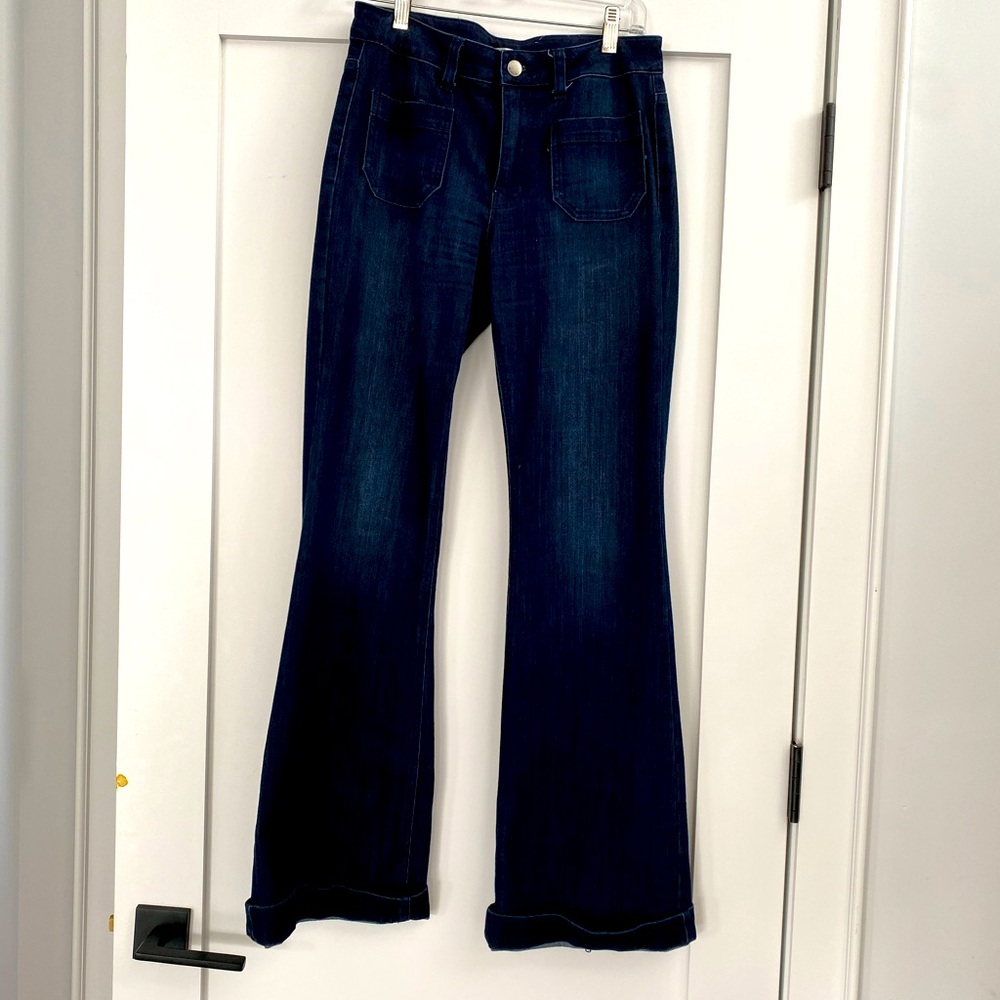Nex Jeans Size 27. Bell bottoms cuffed. pockets and high waisted